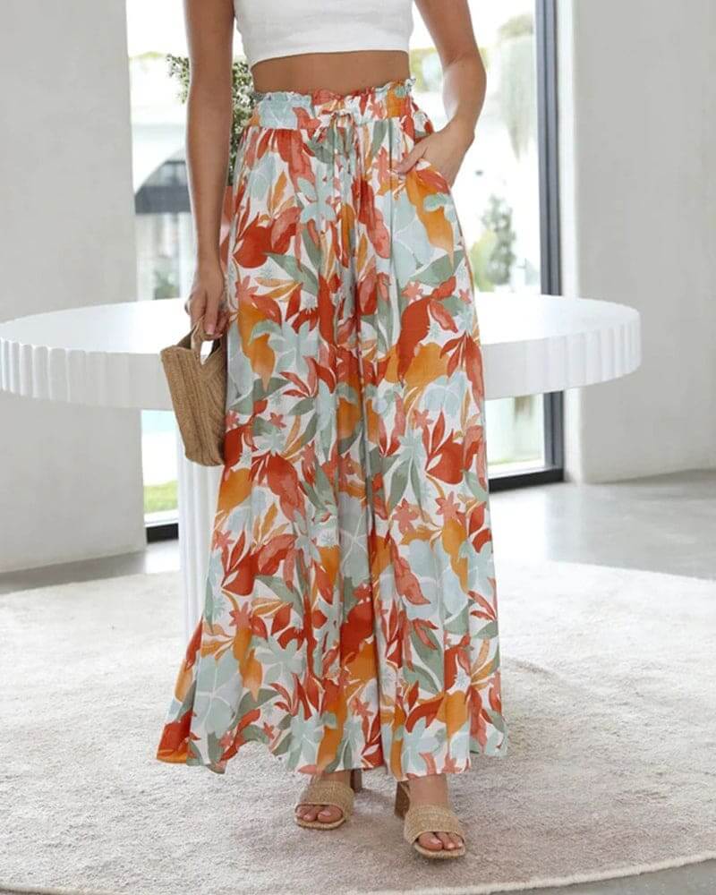 Stylish women's floral print wide-leg trousers, a flowy and fashionable choice for summer.