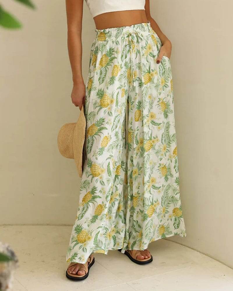 Elegant flowy floral wide-leg trousers for women, offering comfortable and stylish summer fashion.