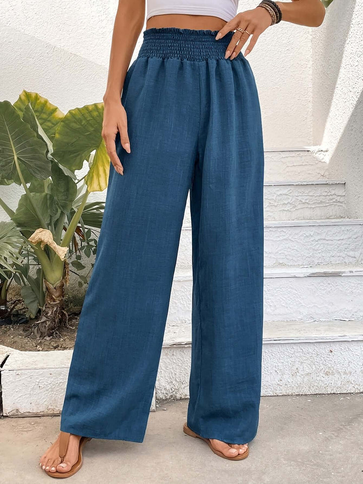 Women's flowy high-waisted wide-leg pants, offering effortless style and comfort for casual wear.