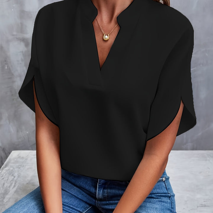 Comfortable pink women's blouse, featuring a flowy design & soft fabric drape.