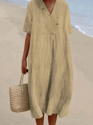 Women's stylish flowy linen-blend midi dress, comfortable & elegant, ideal for summer fashion.