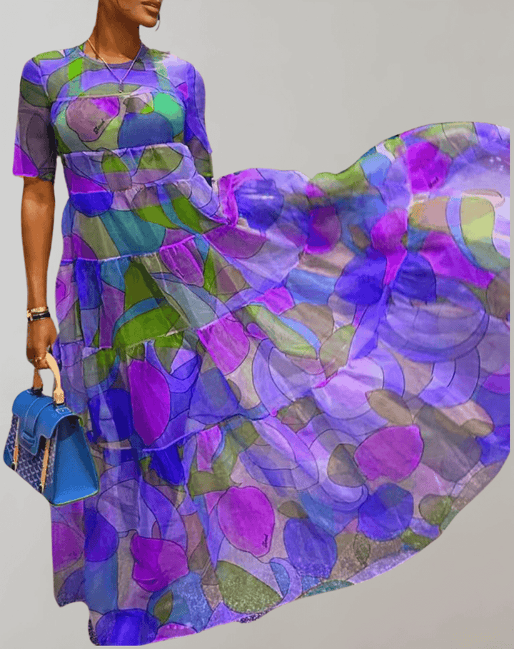 Women's flowy long sleeve dress with elegant floral print. Perfect for casual comfort and spring fashion.