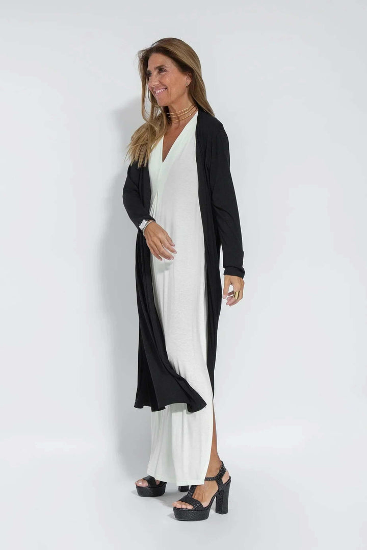 Casual long flowy maxi dress with a stylish cardigan for women. Versatile everyday two-piece outfit.
