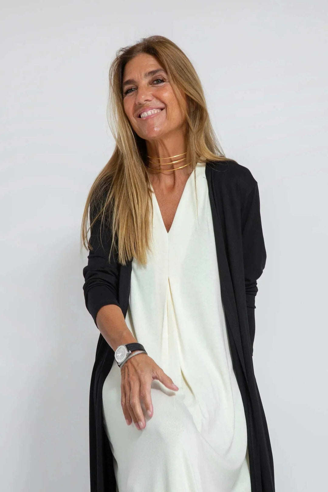Two-piece women's outfit: flowy maxi dress & cardigan. Comfortable, versatile, and elegant fashion.