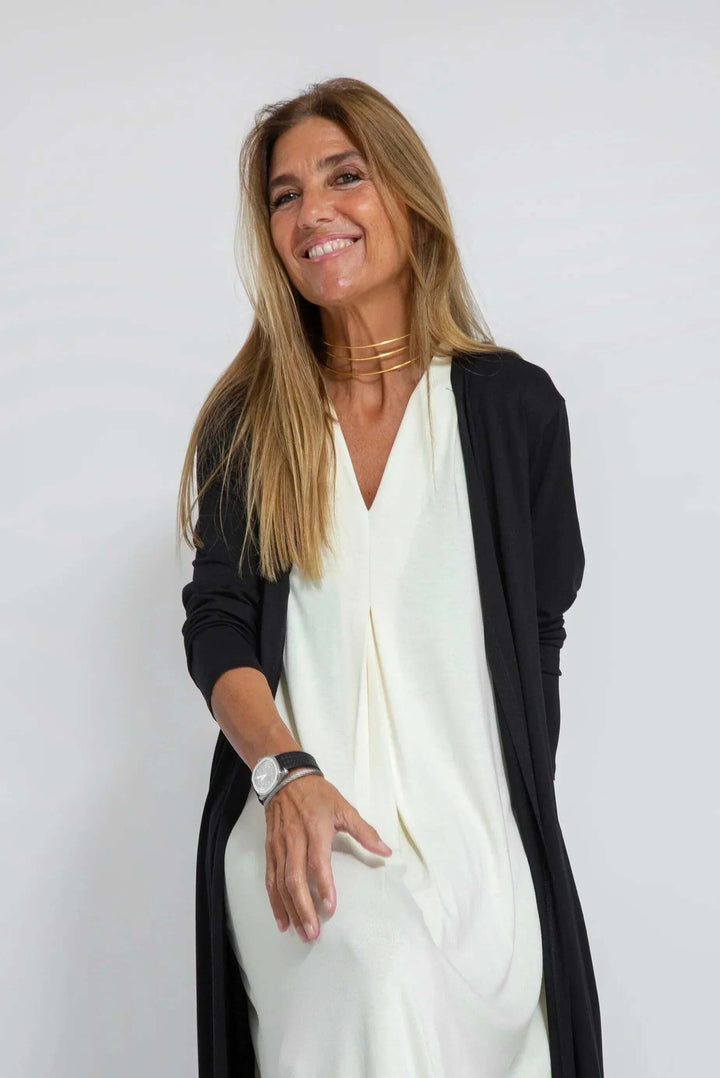 Two-piece women's outfit: flowy maxi dress & cardigan. Comfortable, versatile, and elegant fashion.