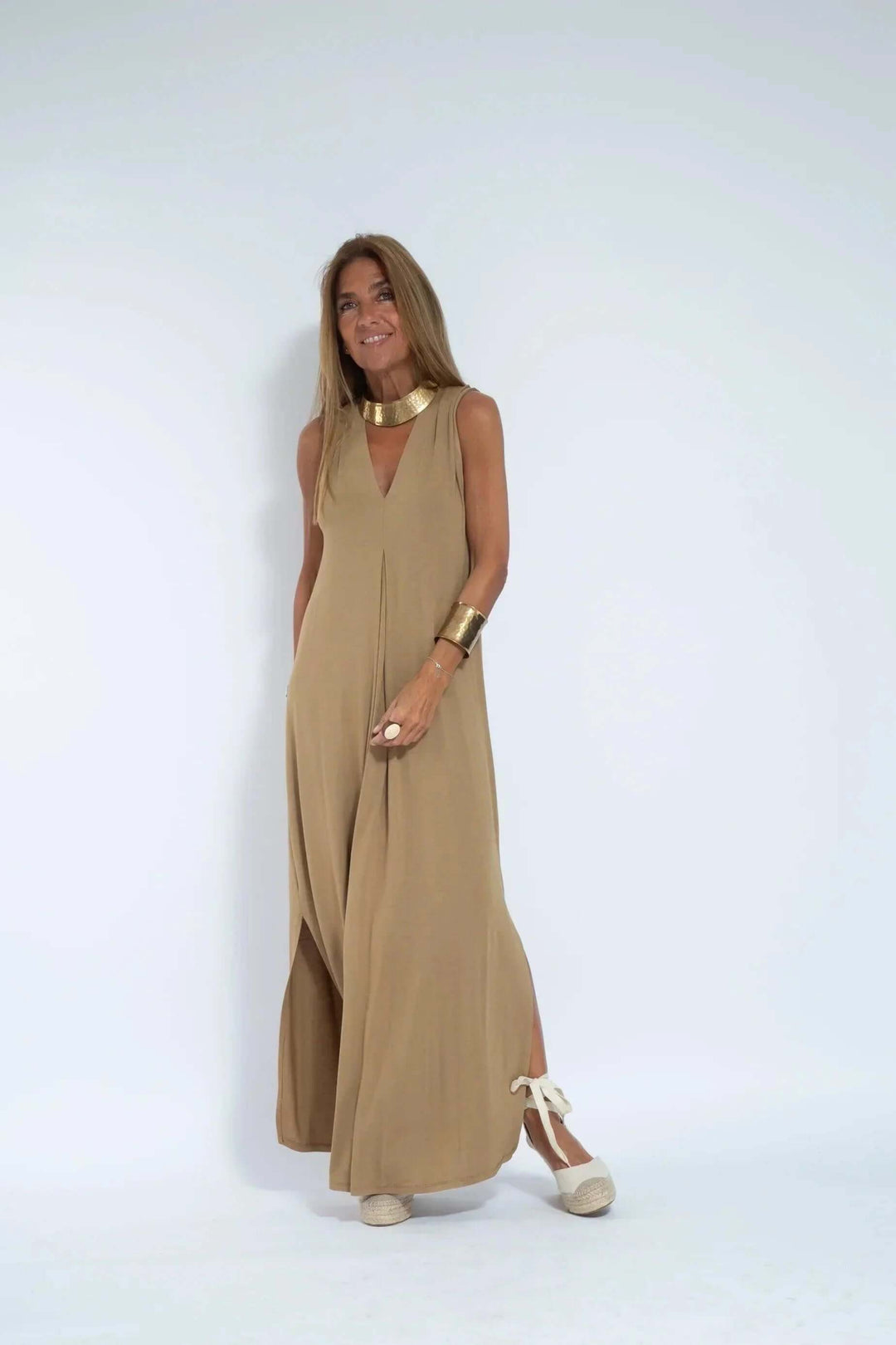 Women's flowy maxi dress and cardigan set for effortless style. Perfect for casual summer days.