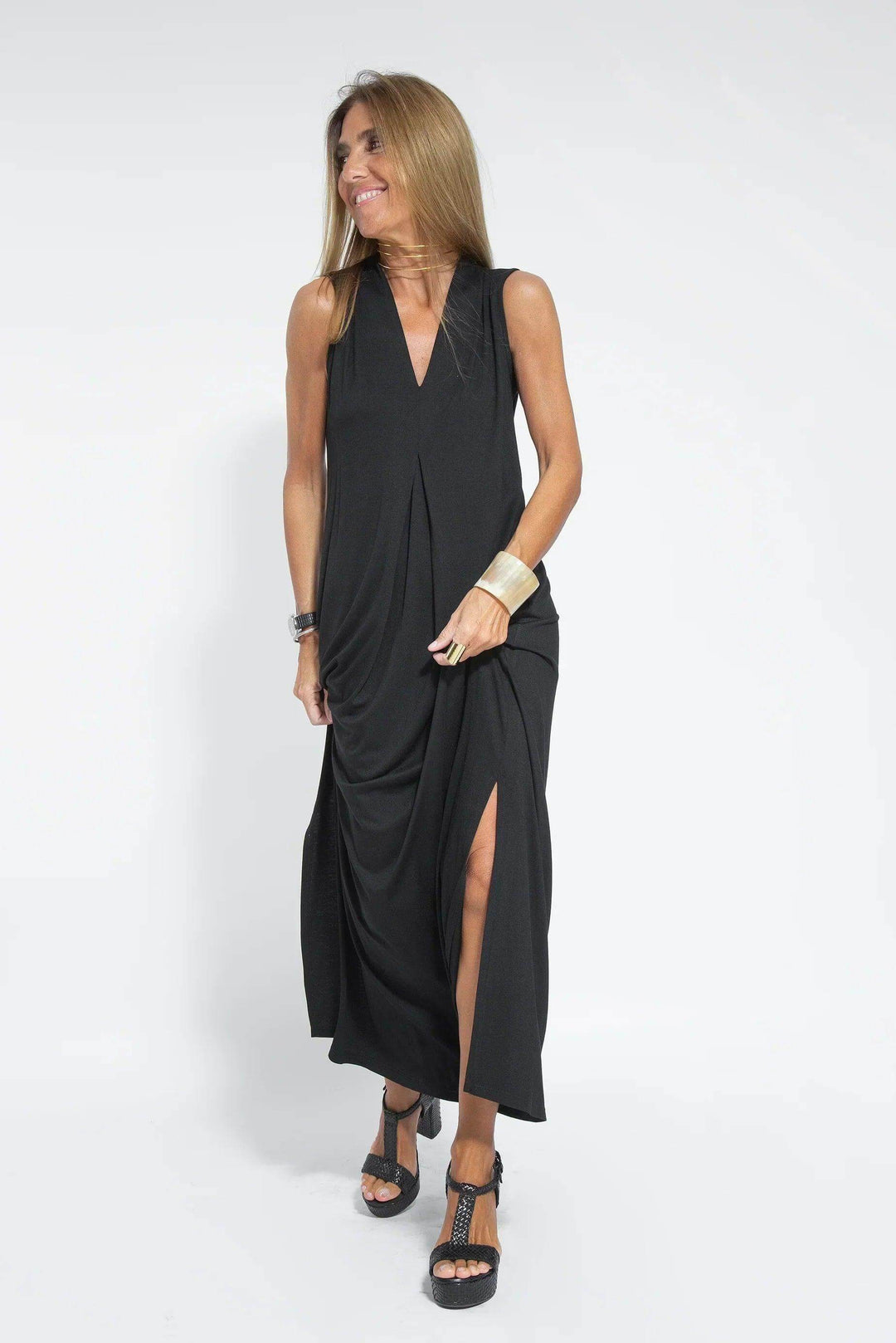 Elegant women's flowy maxi dress with a matching cardigan. Perfect for casual everyday wear.