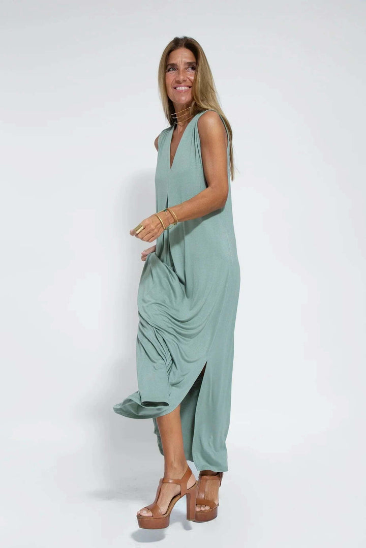Long women's flowy maxi dress with a chic cardigan. Two-piece set for comfortable & elegant everyday wear.