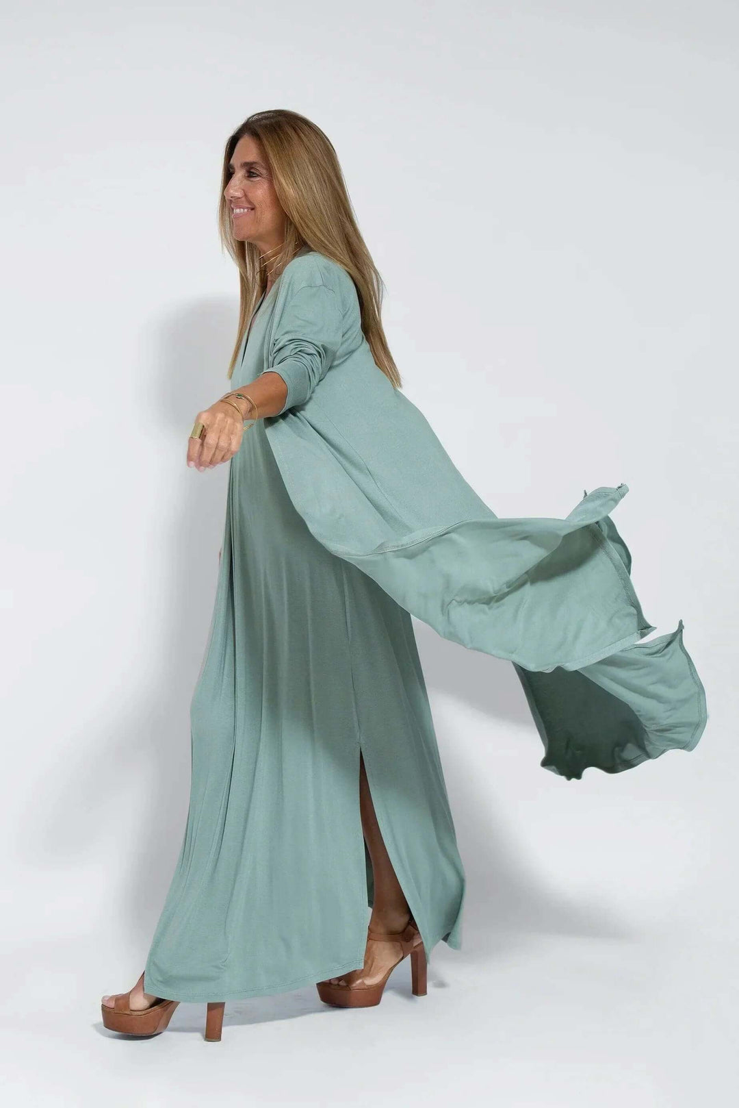 Stylish two-piece women's apparel: flowy maxi dress & cardigan. Perfect for spring/summer fashion.