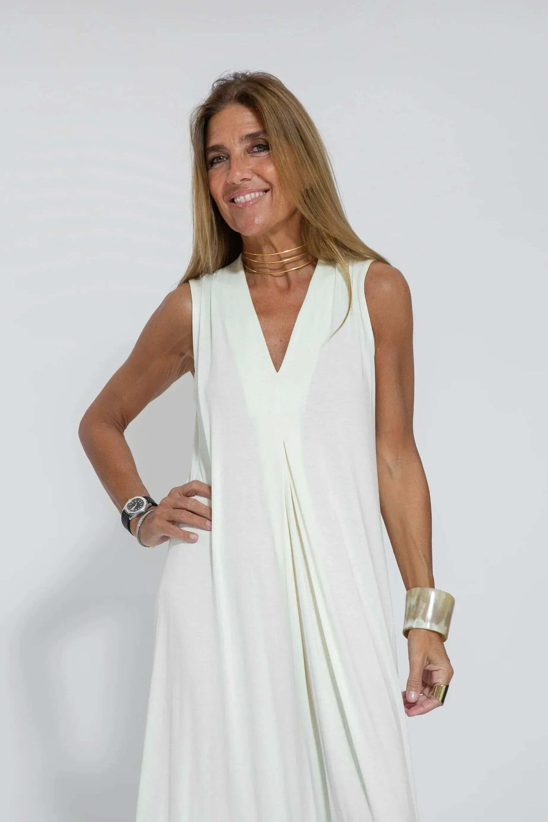 Spring fashion women's flowy maxi dress with a cardigan. Versatile two-piece for comfortable wear.