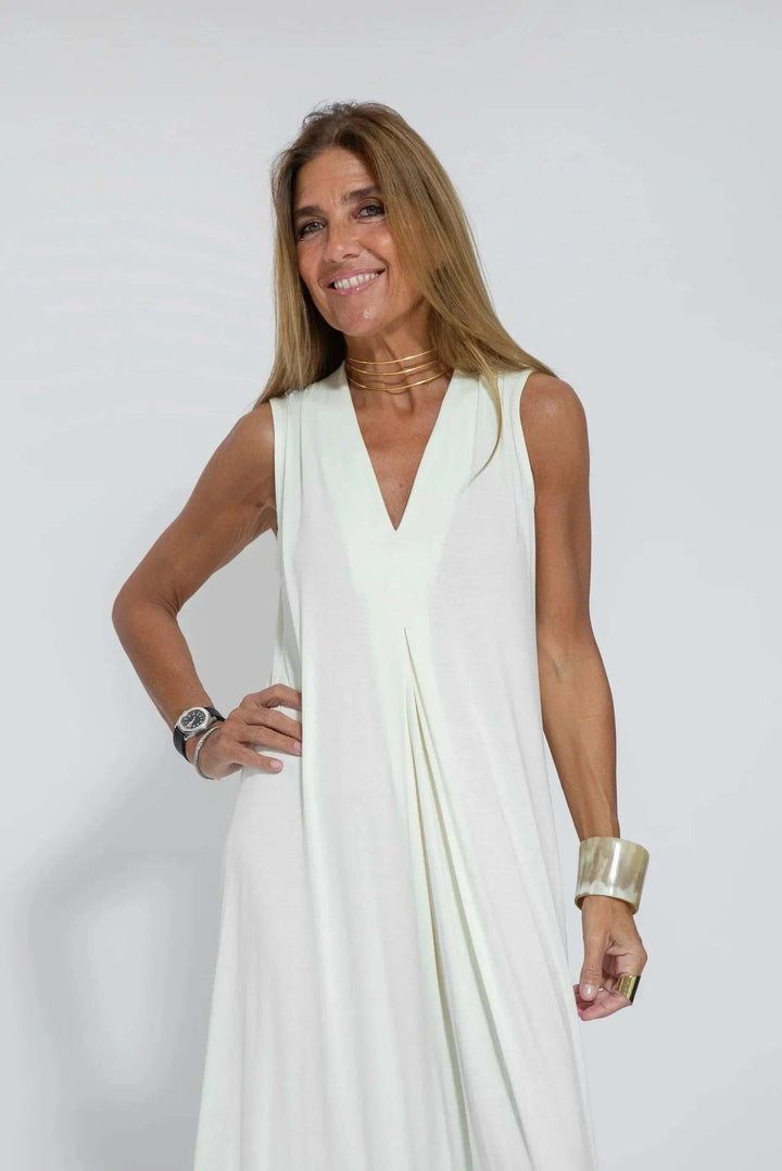 Spring fashion women's flowy maxi dress with a cardigan. Versatile two-piece for comfortable wear.