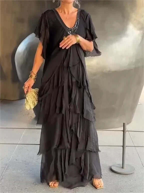Women's flowy summer midi dress with elegant long sleeves, perfect for versatile fashion. Comfortable & stylish.