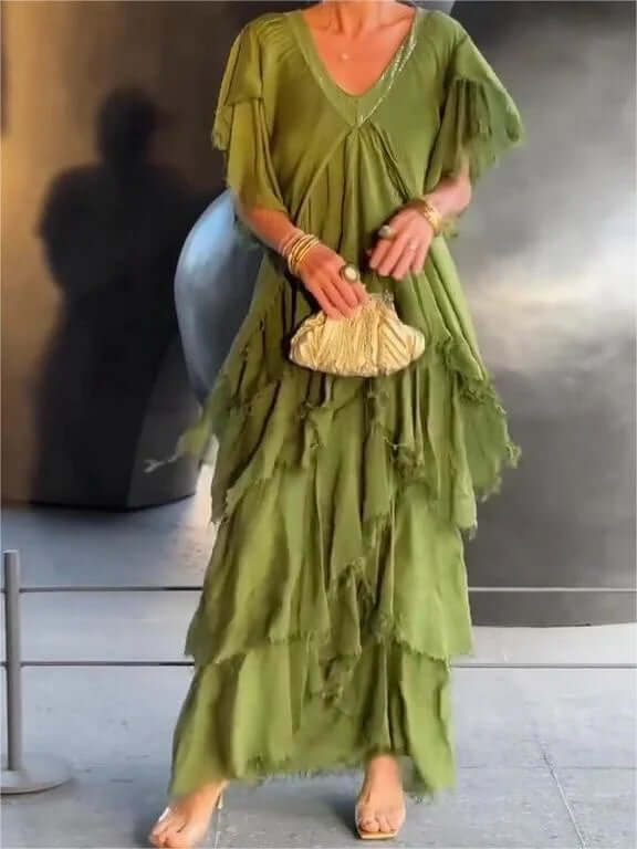 Elegant long sleeve flowy midi dress for women. Versatile for casual summer days or formal events.