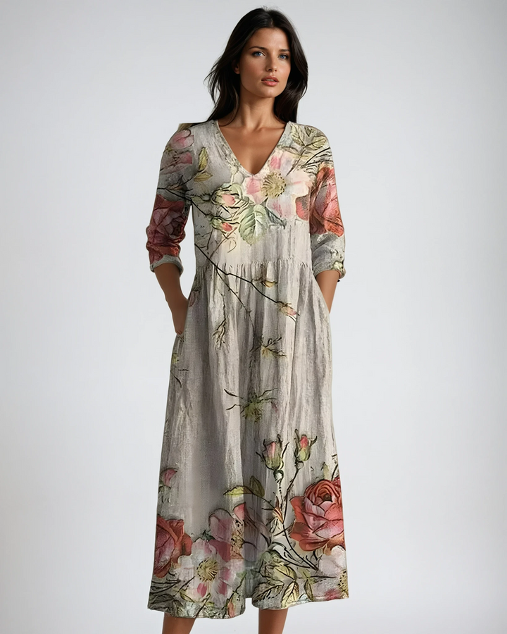 Women's flowy V-neck floral maxi dress. Perfect for summer, casual comfort & beach style.