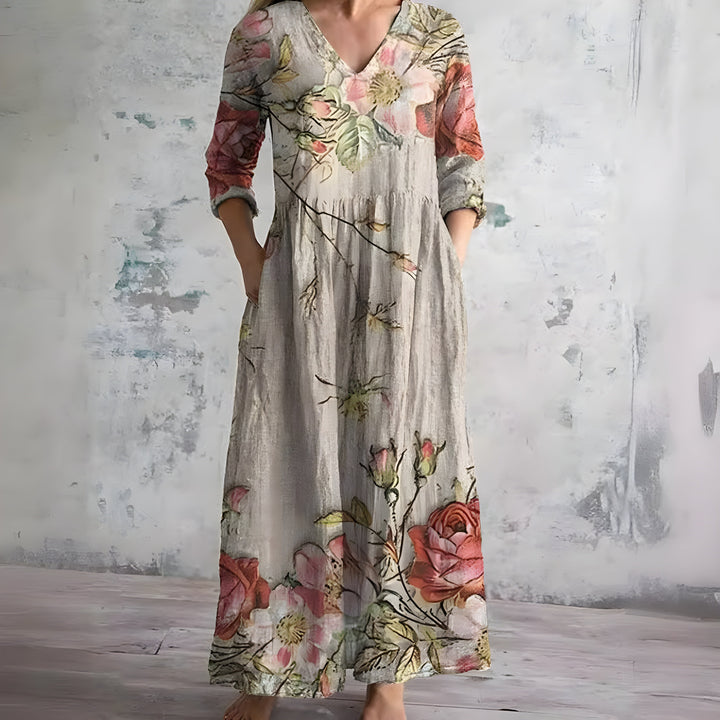 Elegant women's V-neck floral maxi dress. Flowy summer comfort for casual wear & beach trips.