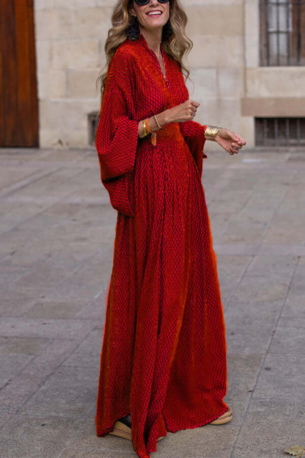 Comfortable women's flowy V-neck midi dress, offering an effortless and elegant A-line silhouette.