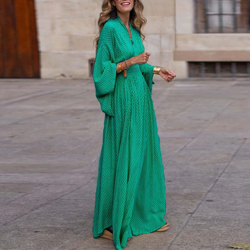 Effortlessly elegant women's flowy V-neck dress. A comfortable midi length for casual or party wear. Summer style.