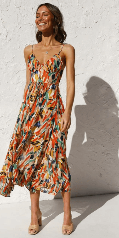 Comfortable women's sleeveless V-neck midi sundress, ideal for beach, summer outings, or casual elegance.