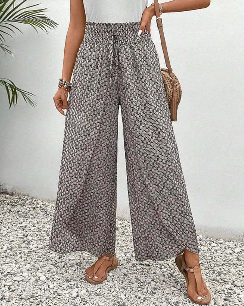 Women's flowy wide-leg palazzo trousers for effortless comfort and style.