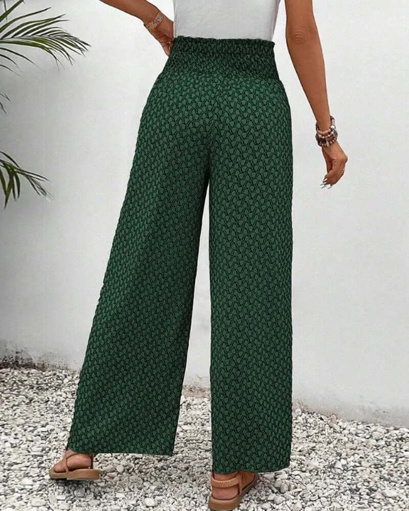 Chic women's high-waisted flowy wide-leg palazzo trousers for effortless summer style.