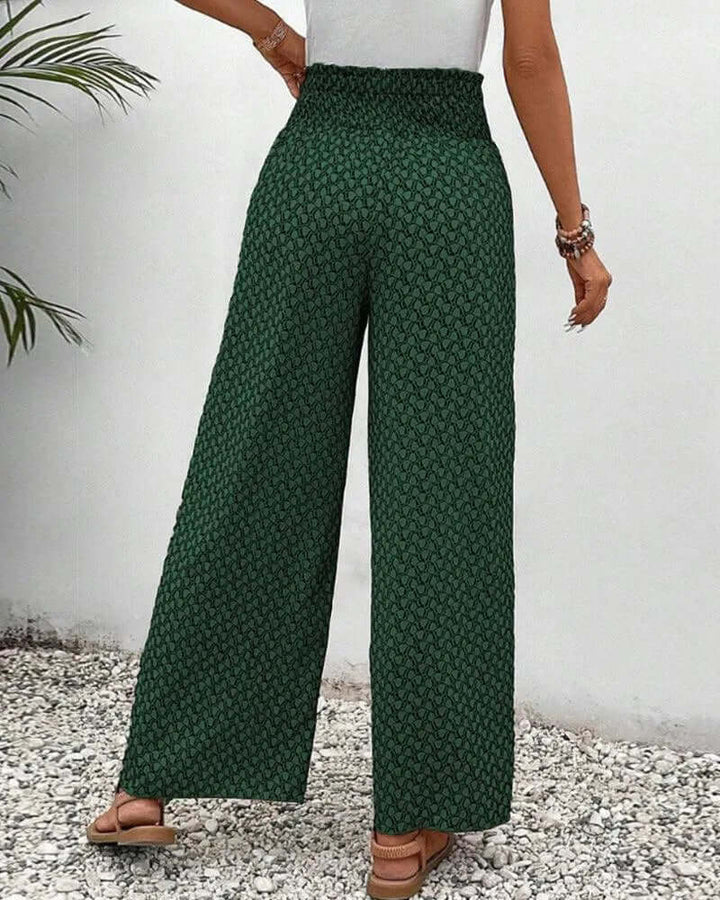 Chic women's high-waisted flowy wide-leg palazzo trousers for effortless summer style.