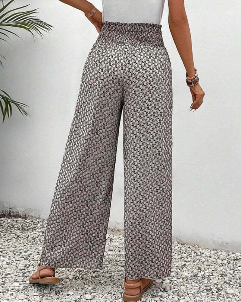 Comfortable high-waisted palazzo pants for women, ideal for casual wear or vacation.