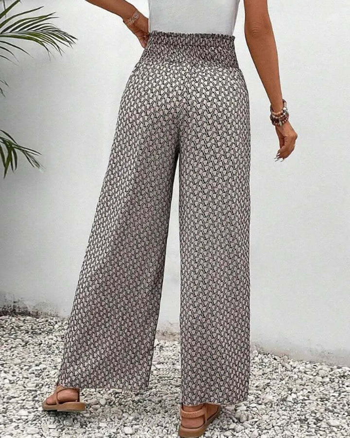 Comfortable high-waisted palazzo pants for women, ideal for casual wear or vacation.