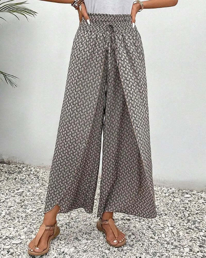 Elegant women's flowy wide-leg trousers, stylish and comfortable for any occasion.