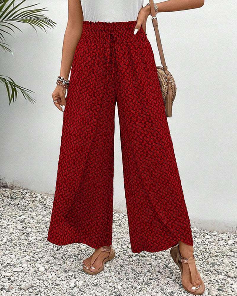 Comfortable grey women's wide-leg pants in breathable viscose blend, featuring a flattering flowy style.