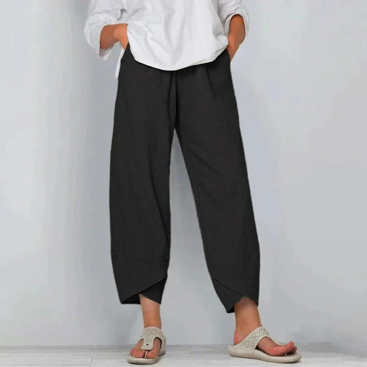 Breathable, relaxed fit women's flowy wide-leg pants; elegant & comfortable for warm weather style.