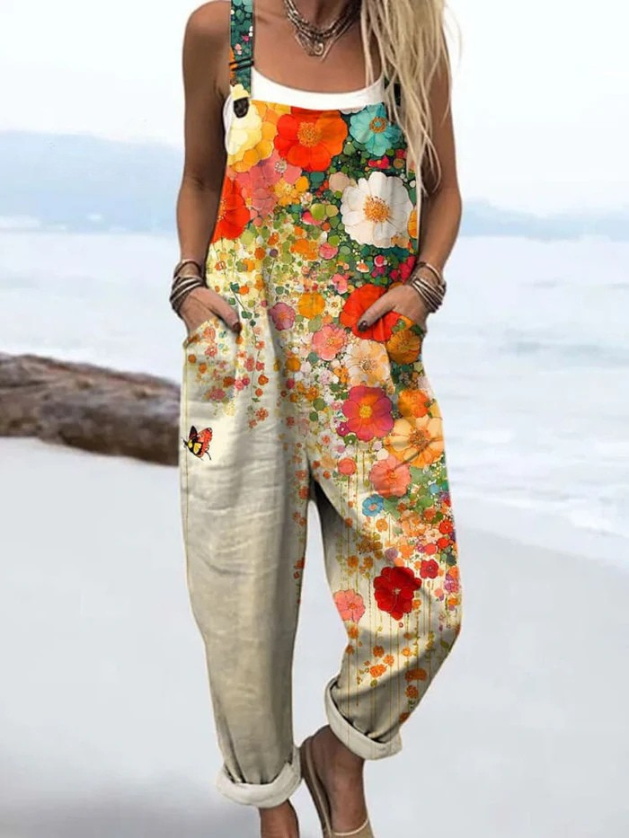 Women's flowy wildflower floral dungarees. Elegant wide-leg jumpsuit for comfortable spring/summer fashion.