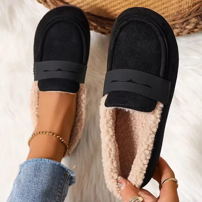 Women's fluffy lined penny loafers, offering cozy slip-on comfort for everyday casual wear.