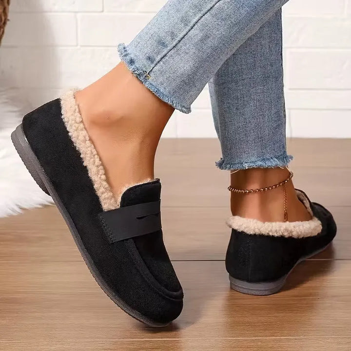 Stylish women's fluffy lined penny loafers, perfect for warm fall and winter fashion.