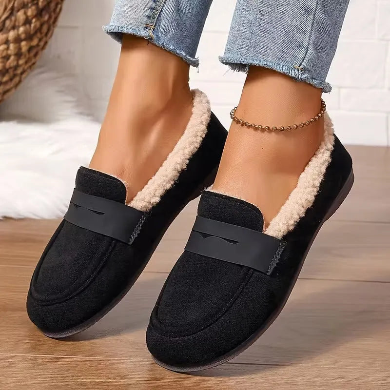 Cozy slip-on women's penny loafers with fluffy lining, providing ultimate comfort for daily wear.