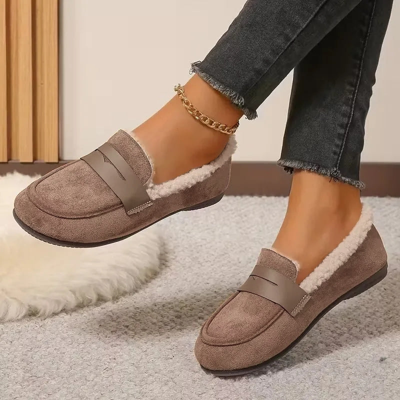Warm fluffy lined women's loafers, a stylish slip-on shoe for fall and winter comfort.