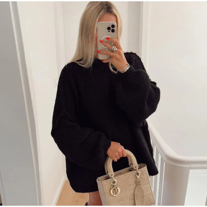 Women's fluffy oversized knit sweater for ultimate cozy comfort & relaxed fit. Perfect winter fashion.