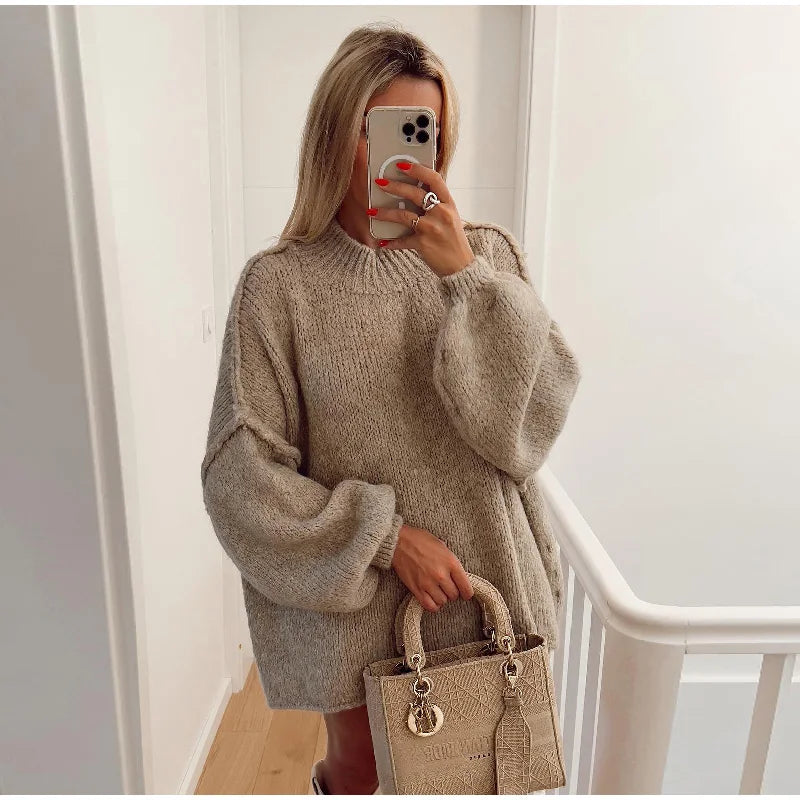 Relaxed fit women's oversized fluffy knit sweater. Versatile casual chic long sleeve top for cozy comfort.