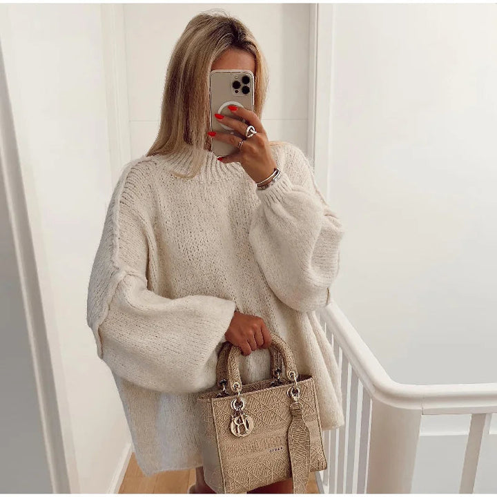 Fluffy women's oversized knit sweater, long sleeve, perfect for cozy comfort in winter. Stylish relaxed fit.