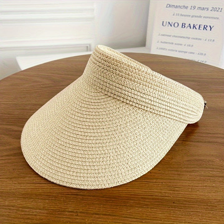 Breathable foldable wide brim sun visor for women, a travel accessory for effective summer sun protection.