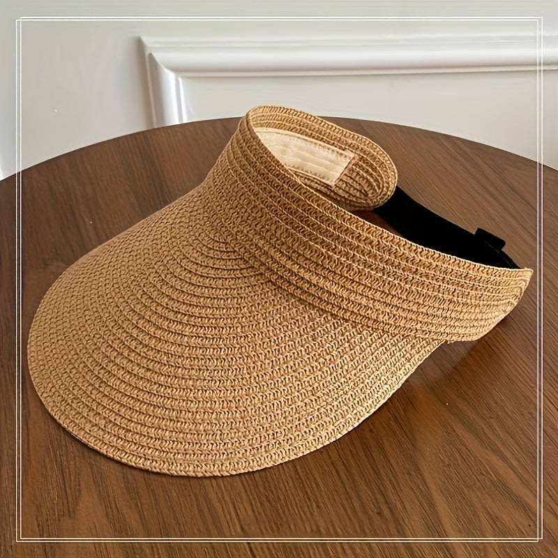 Women's foldable wide brim visor hat, a practical & stylish summer accessory for beach & sun protection.