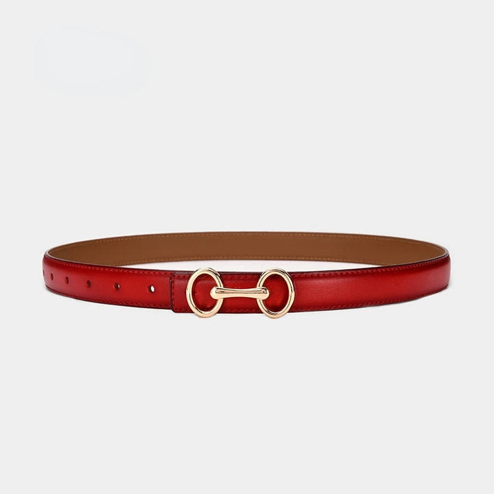 Versatile women's leather dress belt with a detailed Celtic buckle, ideal for cinching waists and adding flair.