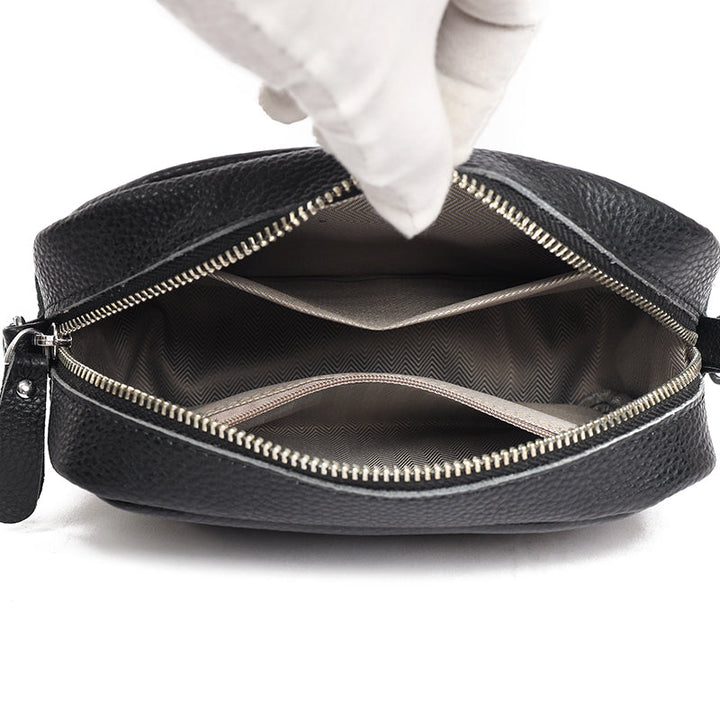 Stylish women's fashion accessory: a genuine leather crossbody bag with an adjustable strap.