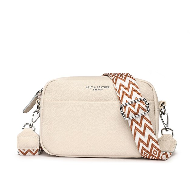Women's fashion-forward leather crossbody bag, designed for style and comfort with an adjustable strap.