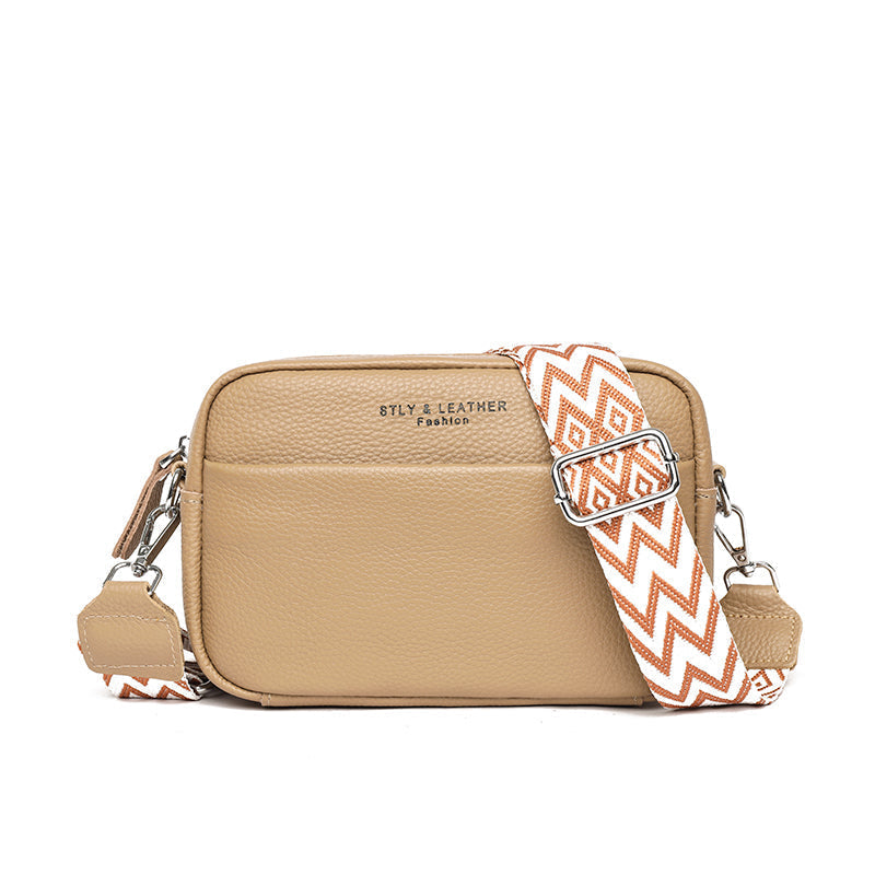 Elegant women's genuine leather shoulder bag, a durable and stylish pebbled leather crossbody accessory.