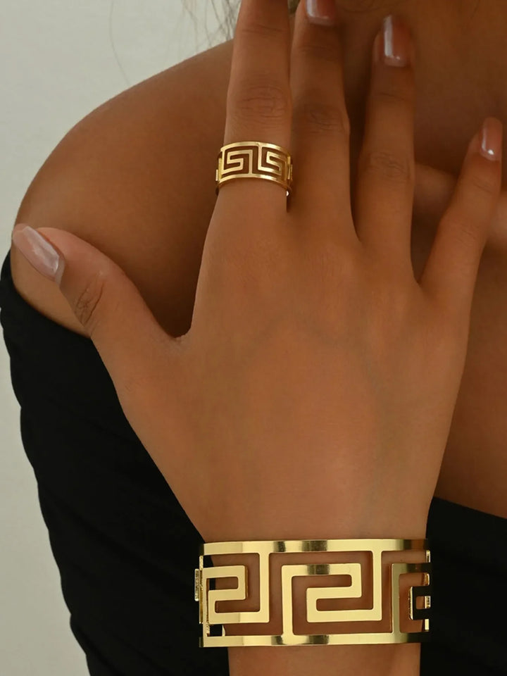 Women's geometric gold tone bracelet & ring set. Elegant fashion jewelry, perfect statement accessory.