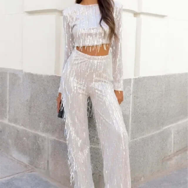 Elegant women's sequin crop top and high-waisted trousers set, a dazzling occasion wear.