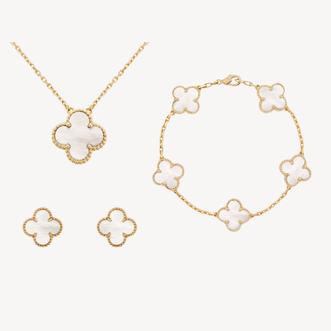 Vibrant gold-tone clover jewelry set for women with colorful options. Necklace, bracelet, & earrings, a lucky charm.