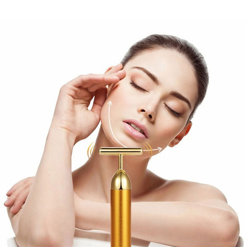 Close-up of the gold vibrating facial roller, a premium beauty tool for anti-aging, radiant skin, and self-care.