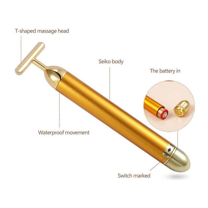 Ergonomic gold vibrating facial roller for women. Gentle massage promotes lymphatic drainage & youthful, glowing skin.