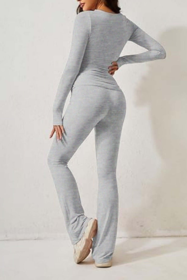 Relax in style with this gray knit women's loungewear set: cozy long-sleeve top and comfy flared pants.